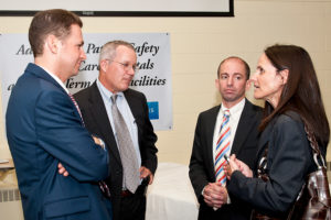 Early Sense Announcement 258 Chatting with (left to right) patient safety expert Dr. Eyal Zimlichman, patient safety expert Dr. David Bates and EarlySense CEO Mr. Avner Halperin following a patient safety seminar and ribbon cutting ceremony at MetroWest Medical Center